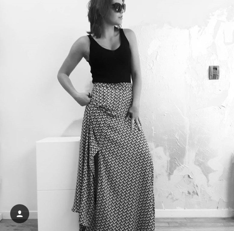 Maxi skirt in dog print. Model wears an XS and is 5'7" tall