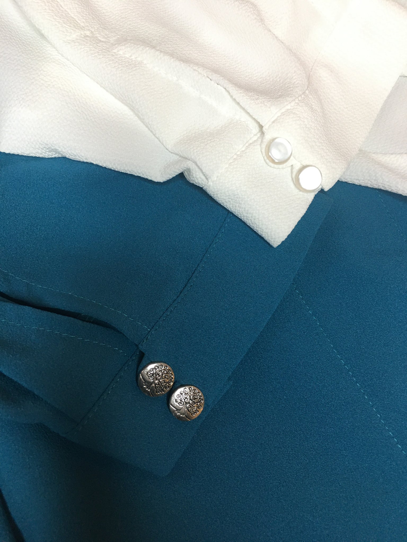 Bella blouse details - buttons may vary