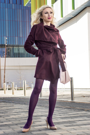 Ava wears the short Helluva Jacket in bordeaux wool blend