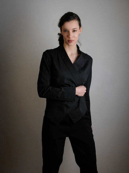 Charcoal Faye Sweater Jacket. Model wears XS and is 5'11" tall. She is wearing Tucks pant in black.