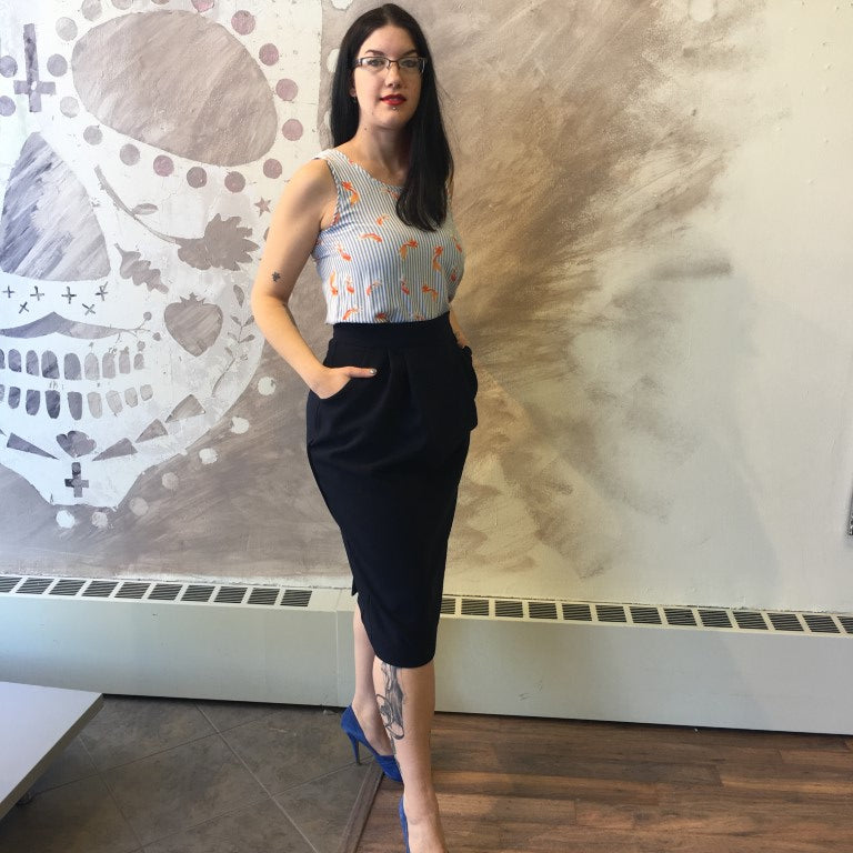Model wears navy Vere skirt in L with M Think Tank. She is 5'8" tall